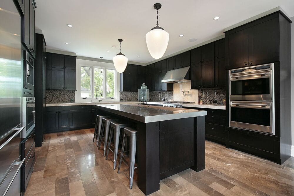 modern kitchen dark finish cabinets light wood flooring