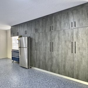 garage cabinet with epoxy flooring and bike racks
